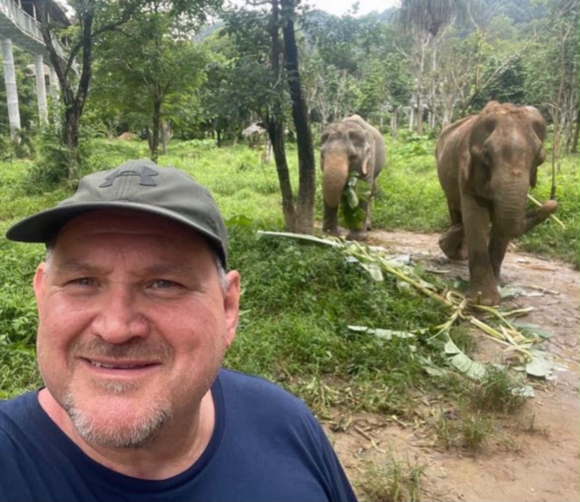 Les with elephants in Thailand